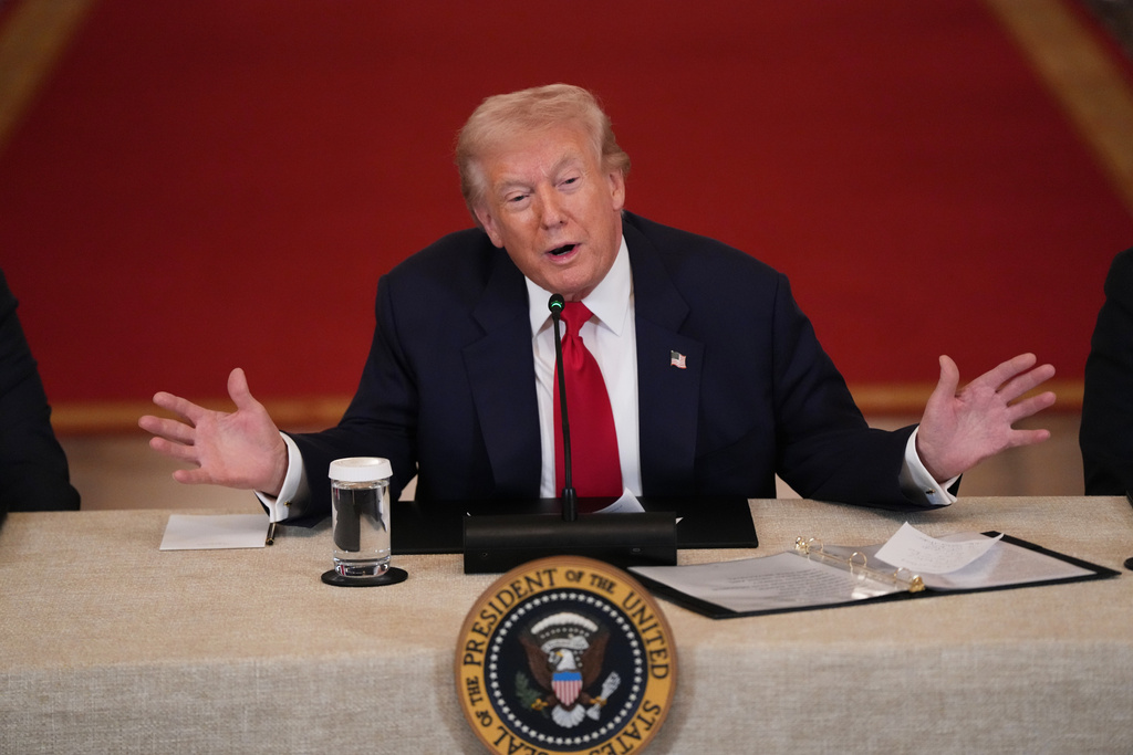 President Donald Trump speaks during a roundtable discussion on college sports in the East Room of the White House, Friday, March 6, 2026, in Washington. (AP Photo/Julia Demaree Nikhinson)