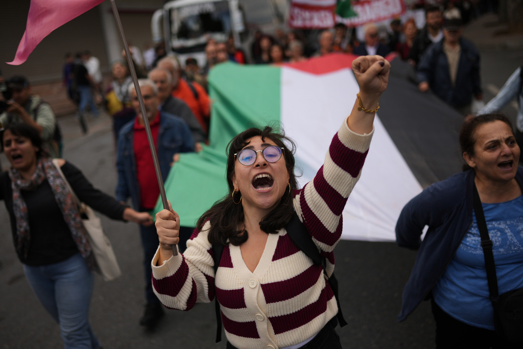 People march during a pro-Palestinian protest in Istanbul, Turkey, Sunday, Oct. 5, 2025. (AP Photo/Francisco Seco)
