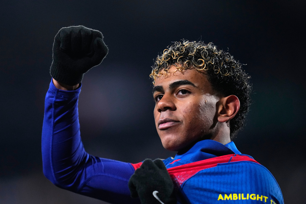 Barcelona's Lamine Yamal celebrates the opening goal during a Copa del Rey quarterfinal soccer match between Albacete and Barcelona, in Albacete, Spain, Tuesday, Feb. 3, 2026. (AP Photo/Manu Fernandez)