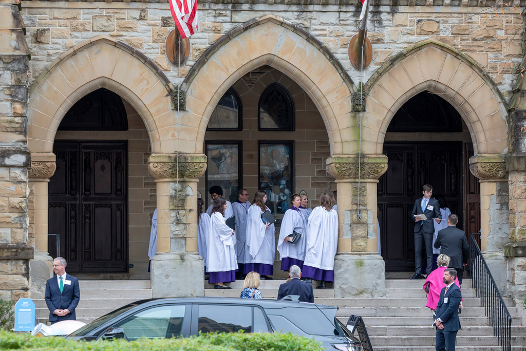 People arrive for a funeral service for Brown University shooting victim Ella Cook, Monday, Dec. 22, 2025, in Birmingham, Ala. (AP Photo/Vasha Hunt)
