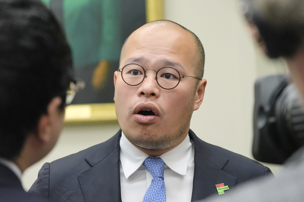 Sebastien Lai speaks with reporters after a Congressional Executive Commission on China regarding the continued imprisonment of his father Jimmy Lai on Capitol Hill, Wednesday, Sept. 16, 2026, in Washington. (AP Photo/Mariam Zuhaib)