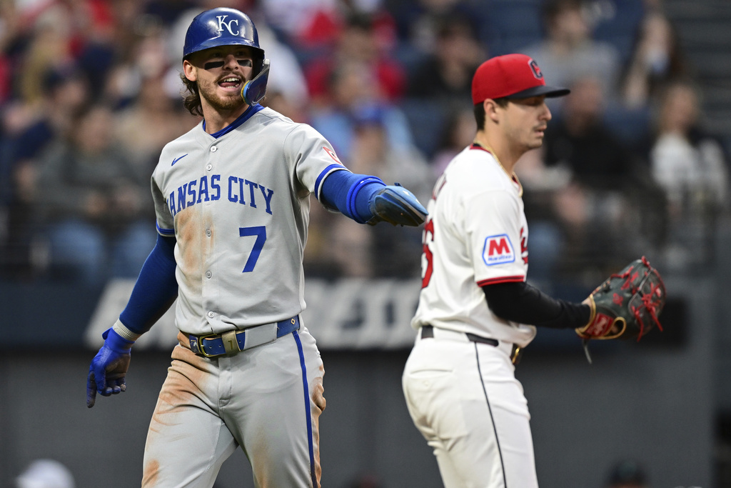 Kansas City Royals' Bobby Witt Jr. celebrates after scoring a run on an RBI single by Vinnie Pasquantino during the third inning of a baseball game against the Cleveland Guardians, Wednesday, Sept. 10, 2025, in Cleveland. (AP Photo/David Dermer)