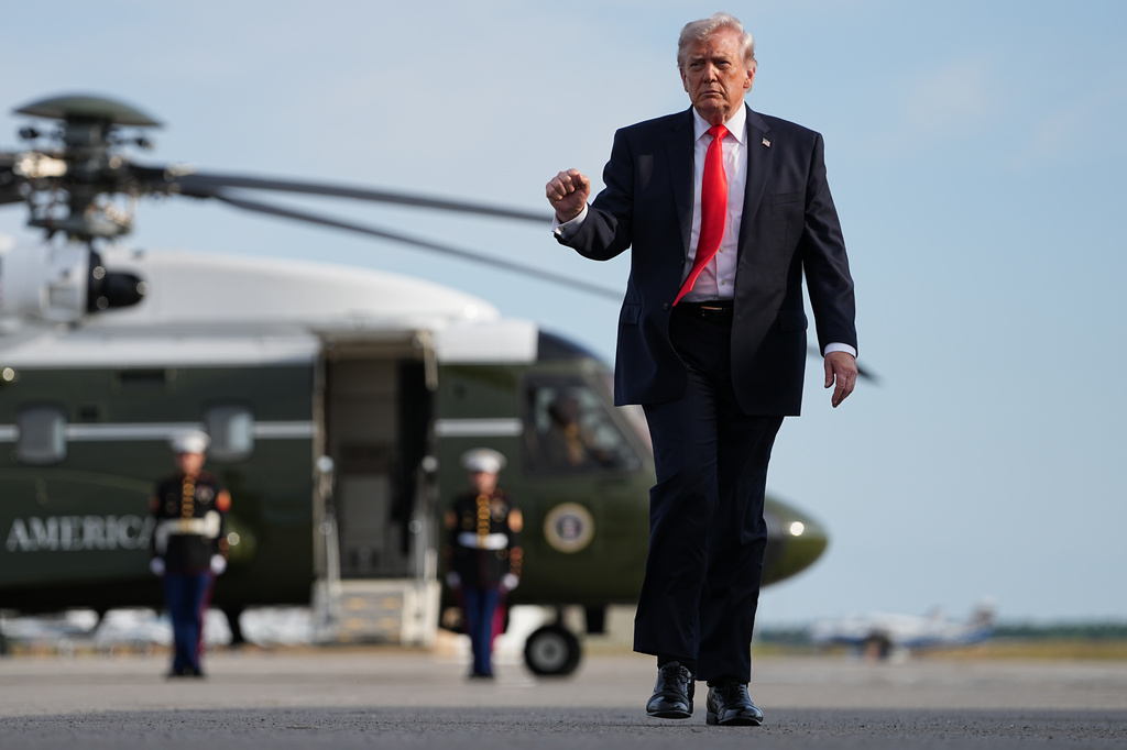 President Donald Trump walks from Marine One to board Air Force One at Ocala International Airport, in Ocala Fla., Friday, May 1, 2026, after speaking at an event in The Villages, Fla. (AP Photo/Matt Rourke)