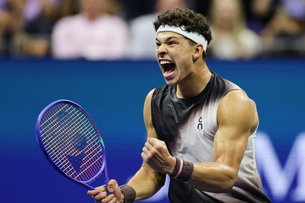 Ben Shelton, of the United States, celebrates after a point in the fifth set against Carlos Alcaraz, of Spain, during the quarterfinal round of the U.S. Open tennis championships, early Wednesday, Sept. 9, 2026, in New York. (AP Photo/Adam Hunger)