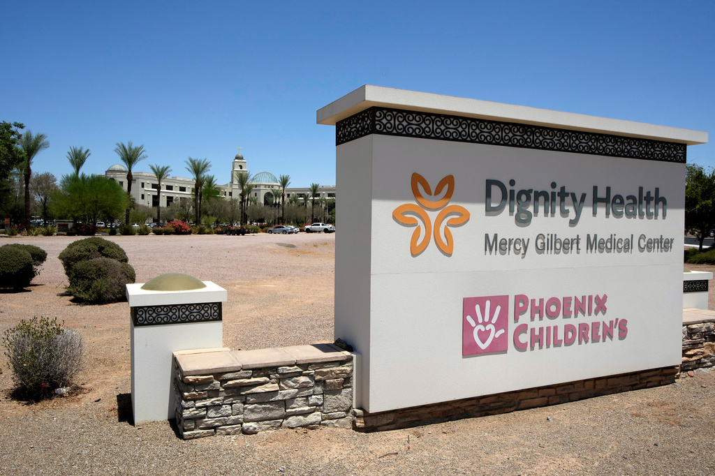 Mercy Gilbert Medical Center, shown here, where an 18-month-old toddler discovered in a backyard pool and taken to the hospital in February, was declared dead before being found breathing hours later in a room that serves as the hospital morgue, according to recently released police records, Monday, July 6, 2026, in Gilbert, Ariz. (AP Photo/Ross D. Franklin)