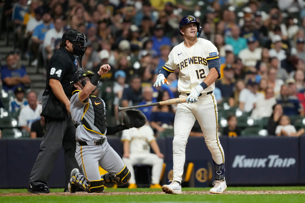 Milwaukee Brewers' Cooper Pratt (12) reacts after striking out during the ninth inning of a baseball game against the Pittsburgh Pirates, Monday, Aug. 3, 2026, in Milwaukee. (AP Photo/Aaron Gash)