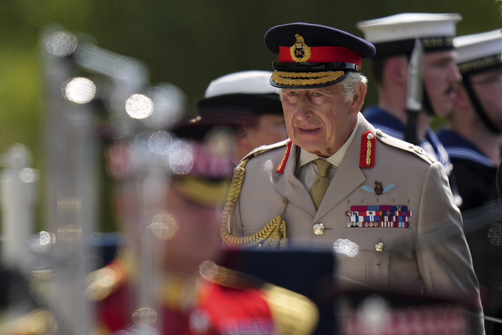 Britain's King Charles III, Patron of the Royal British Legion, arrives to attend a Service of Remembrance at the National Memorial Arboretum to commemorate the 80th Anniversary of VJ Day in Alrewas, England, Friday, Aug. 15, 2025.(AP Photo/Alastair Grant, Pool)