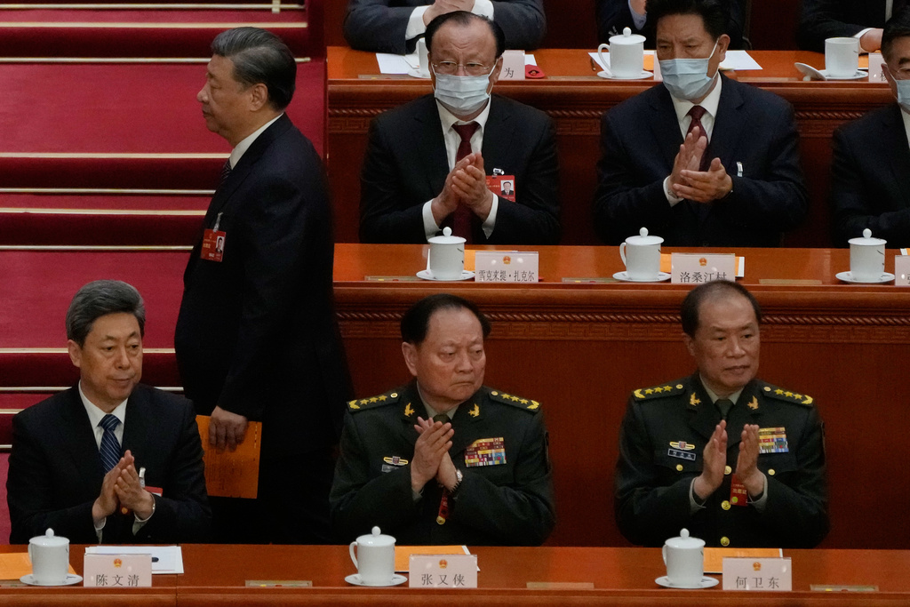 FILE - Chinese President Xi Jinping walks past Gen. Zhang Youxia, vice chairman of China's Central Military Commission, below center, during a session of the National People's Congress (NPC) at the Great Hall of the People, in Beijing, China on March 12, 2023. (AP Photo/Andy Wong, File)