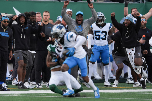 The Carolina Panthers sideline reacts as cornerback Jaycee Horn (8) intercepts a pass against the New York Jets during the fourth quarter of an NFL football game, Sunday, Oct. 19, 2025, in East Rutherford, N.J. (AP Photo/Seth Wenig) The Carolina Panthers sideline reacts as cornerback Jaycee Horn (8) intercepts a pass against the New York Jets during the fourth quarter of an NFL football game, Sunday, Oct. 19, 2025, in East Rutherford, N.J. (AP Photo/Seth Wenig)