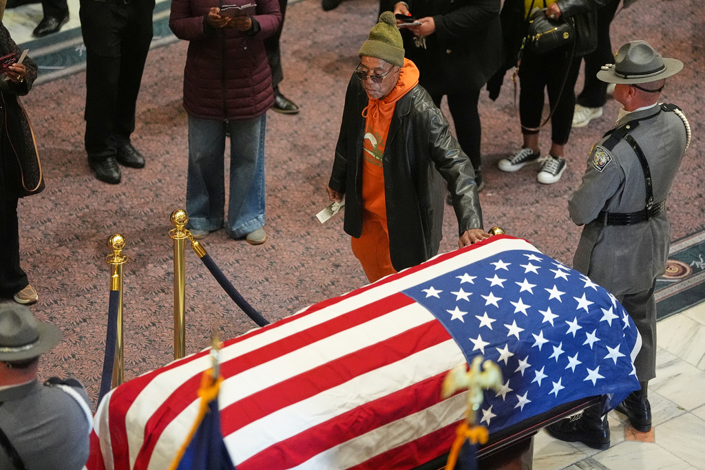 People pay their respects to the Rev. Jesse Jackson inside the South Carolina Statehouse as he lies in state Monday, March 2, 2026, in Columbia, S.C. (AP Photo/Matt Kelley, Pool)