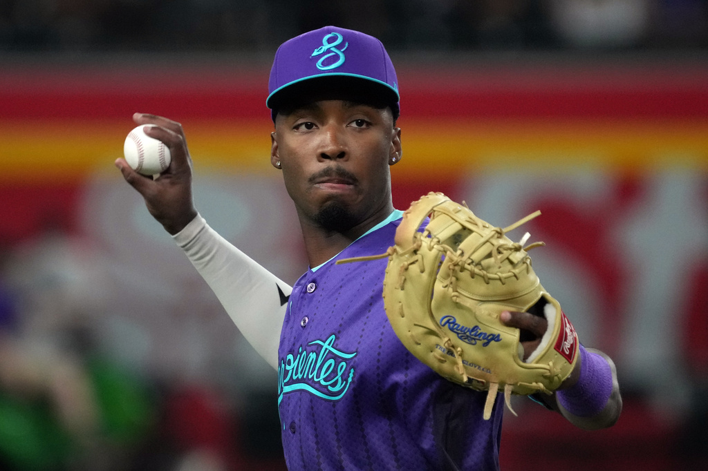 Arizona Diamondbacks first baseman Lujames Groover warms up before a baseball game against the Washington Nationals, Friday, June 5, 2026, in Phoenix. (AP Photo/Rick Scuteri)