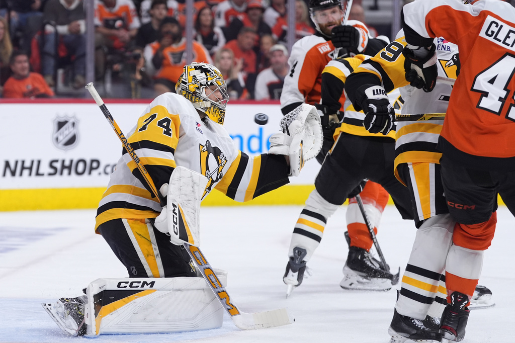 Pittsburgh Penguins' Stuart Skinner cannot stop a goal by Philadelphia Flyers' Nick Seeler during the second period of Game 3 in the first round of the NHL Stanley Cup hockey playoffs Wednesday, April 22, 2026, in Philadelphia. (AP Photo/Matt Slocum)