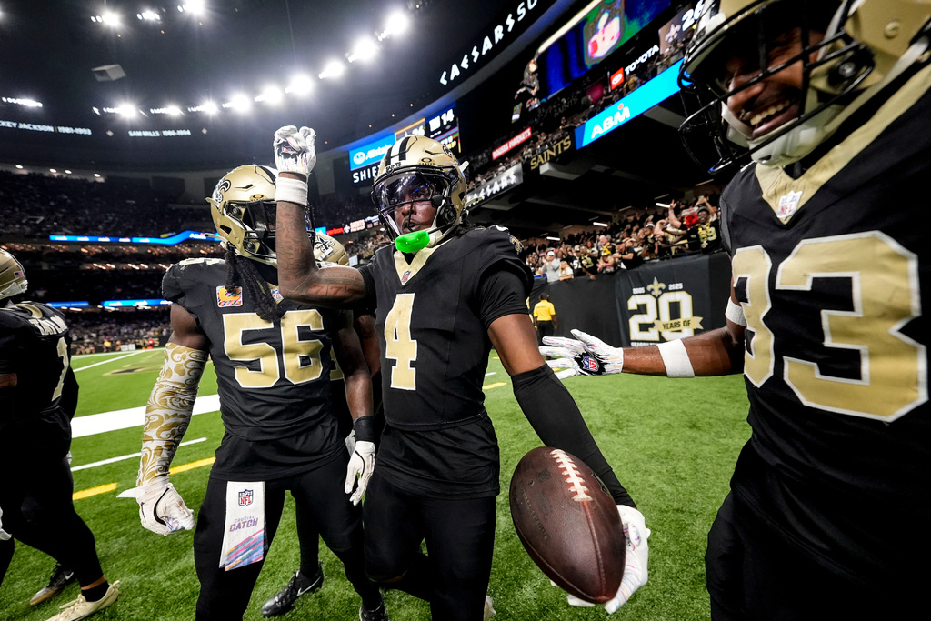 New Orleans Saints cornerback Kool-Aid McKinstry (4) celebrates his interception against the New York Giants in the second half of an NFL football game, Sunday, Oct. 5, 2025, in New Orleans. (AP Photo/Gerald Herbert)