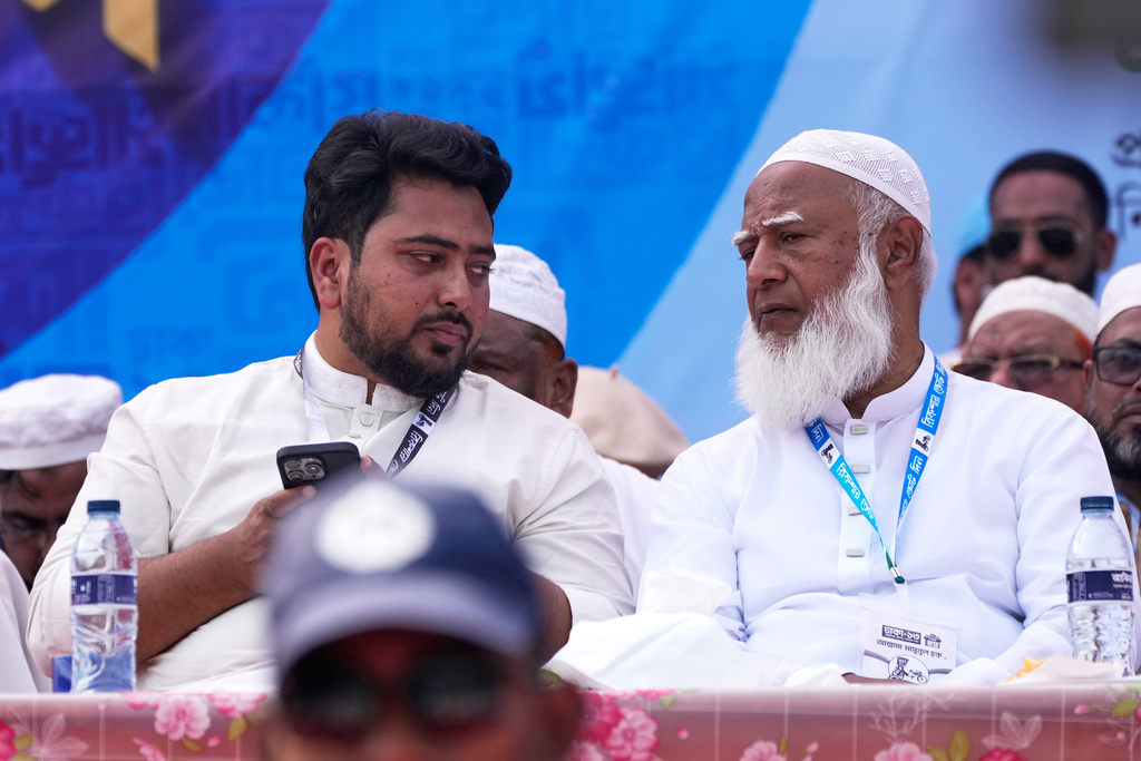 National Citizen Party (NCP) convener Nahid Islam, left, talks to Jamaat-e-Islami leader Shafiqur Rahman during an election rally in Dhaka, Bangladesh, on Feb. 9, 2026. (AP Photo/Anupam Nath)