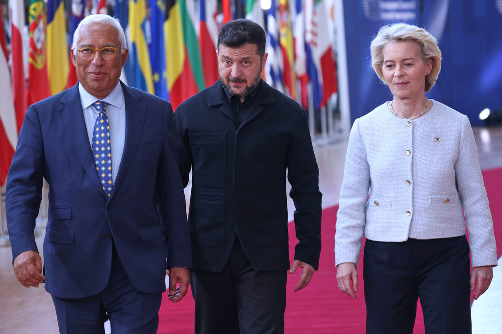 From left, European Council President Antonio Costa, Ukraine's President Volodymyr Zelenskyy and European Commission President Ursula von der Leyen arrive for the EU summit in Brussels, Thursday, June 18, 2026. (AP Photo/Omar Havana)