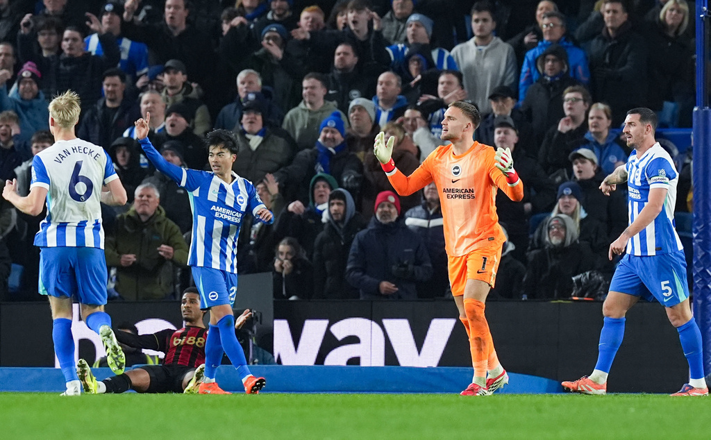 Brighton and Hove Albion goalkeeper Bart Verbruggen reacts after a penalty decision during the English Premier League match between Brighton & Hove Albion and AFC Bournemouth in Brighton and Hove, England, Monday, Jan. 19, 2026. (Gareth Fuller/PA via AP)