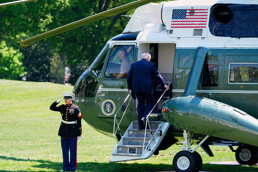 President Donald Trump boards Marine One as he departs the White House, Thursday, April 16, 2026, in Washington. (AP Photo/Manuel Balce Ceneta)