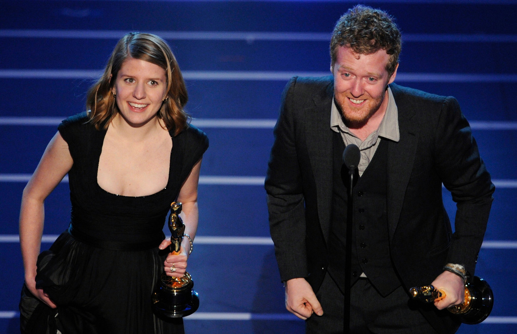 FILE - Marketa Irglova, left, and Glen Hansard accept the Oscar for best original song for "Falling Slowly" from the motion picture "Once" at the 80th Academy Awards in Los Angeles on Feb. 24, 2008. (AP Photo/Mark J. Terrill, File)