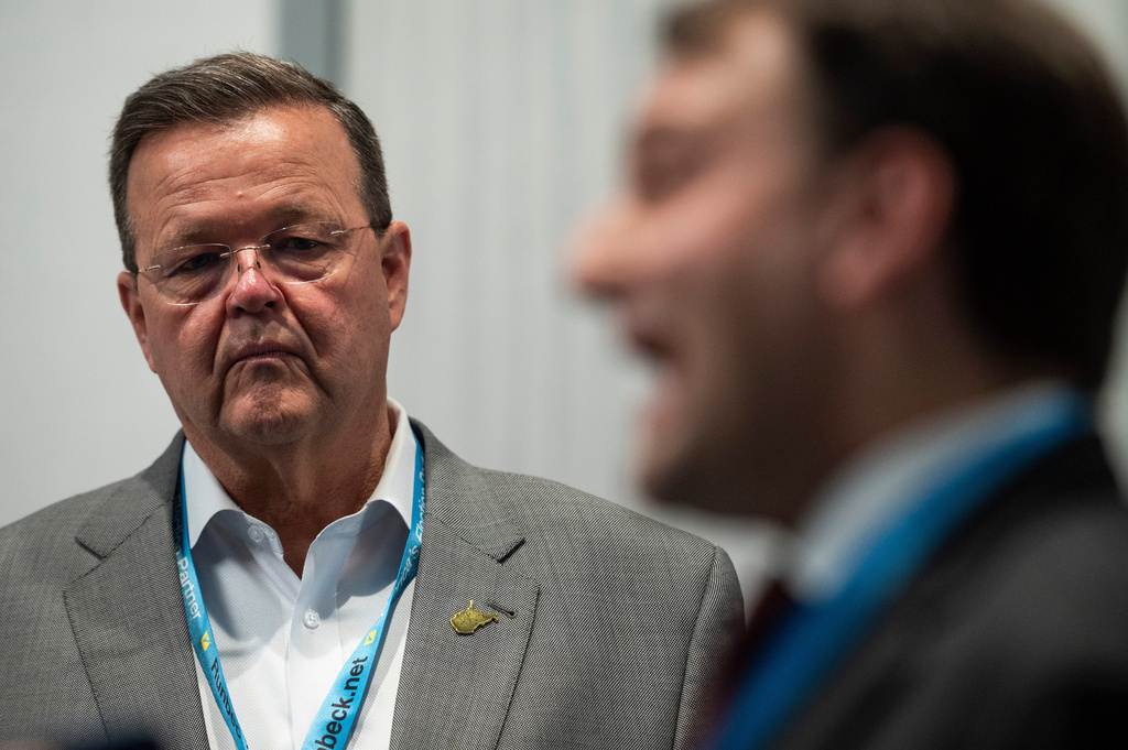 FILE - West Virginia Secretary of State Kris Warner, left, watches Wyoming Secretary of State Chuck Gray speak with a reporter during the National Associate of Secretaries of State Conference in Washington, Friday, Jan. 30, 2026. (AP Photo/Cliff Owen,File)