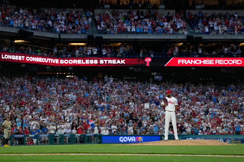 Philadelphia Phillies pitcher Cristopher Sánchez gets a standing ovation for the longest consecutive scoreless innings streak during the seventh inning of a baseball game against the San Diego Padres on Wednesday, June 3, 2026, in Philadelphia. (AP Photo/Matt Slocum)