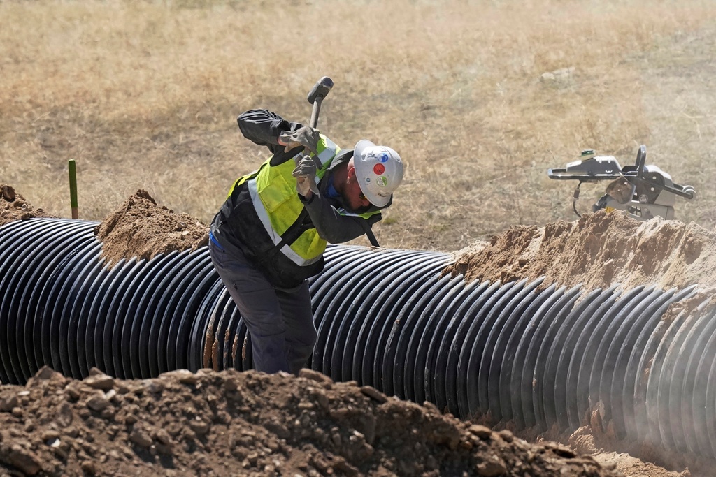 FILE - Construction continues at the Lithium Nevada Corp. mine site Thacker Pass project, April 24, 2023, near Orovada, Nev. (AP Photo/Rick Bowmer, File)