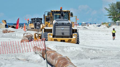 Workers replace the sand washed away by recent hurricanes along the gulf Thursday, Sept. 25, 2025, in Indian Rocks Beach, Fla. (AP Photo/Chris O'Meara) Workers replace the sand washed away by recent hurricanes along the gulf Thursday, Sept. 25, 2025, in Indian Rocks Beach, Fla. (AP Photo/Chris O'Meara)
