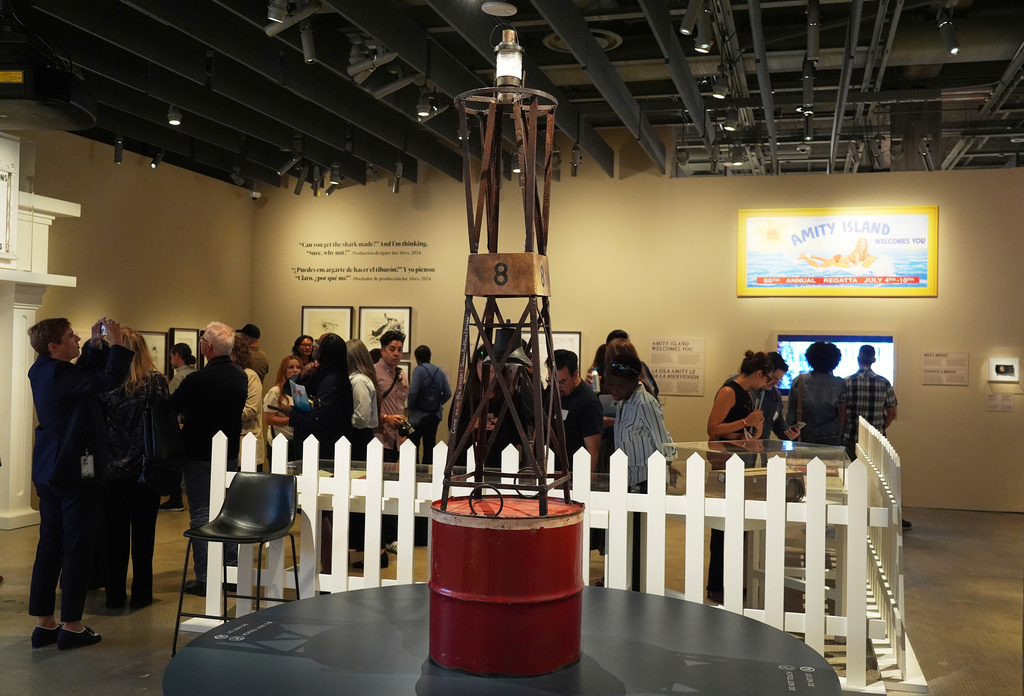 A prop buoy from the 1975 film "Jaws" is displayed for visitors at the "Jaws: The Exhibition" press preview on Wednesday, Sept. 10, 2025, at the Academy Museum of Motion Pictures in Los Angeles. (AP Photo/Chris Pizzello)