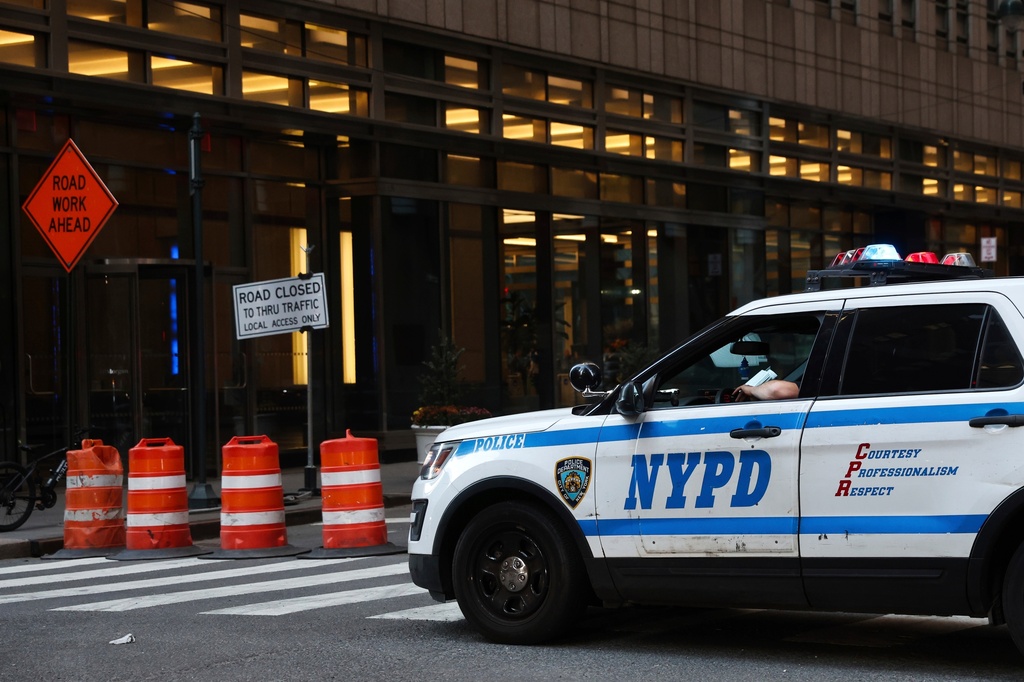 FILE - An NYPD cruiser sits at the intersection of a Midtown street closed due to construction, Nov. 7, 2024, in New York. (AP Photo/Heather Khalifa, File)