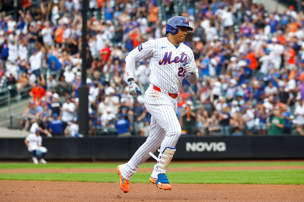 New York Mets' Juan Soto runs the bases after hitting a home run against the Houston Astros during the first inning of a baseball game, Sunday, Aug. 30, 2026, in New York. (AP Photo/Noah K. Murray)