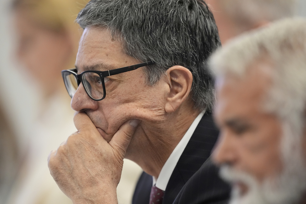 Committee member, Dr. James Pagano listens during a meeting of the Advisory Committee on Immunization Practices at the CDC on Thursday, Sept. 18, 2025, in Chamblee, Ga. (AP Photo/Brynn Anderson)