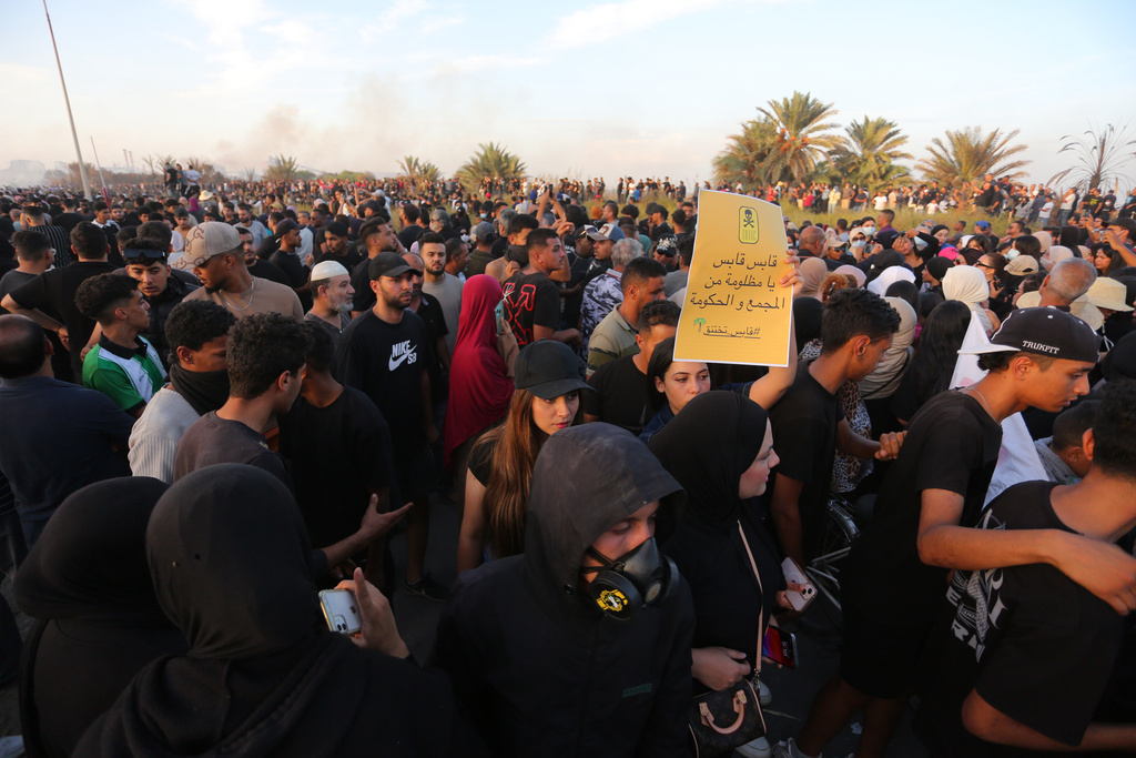 People take part in a demonstration against pollution caused by chemical factories, in Gabes, Tunisia, Wednesday, Oct. 16, 2025. (AP Photo/Bassem Aouini)