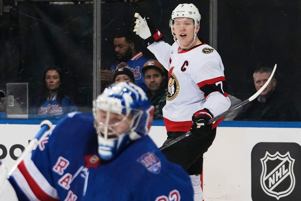 Ottawa Senators' Brady Tkachuk (7) celebrates after scoring a goal as New York Rangers goaltender Jonathan Quick (32) looks away during the first period of an NHL hockey game Wednesday, Jan. 14, 2026, in New York. (AP Photo/Frank Franklin II)