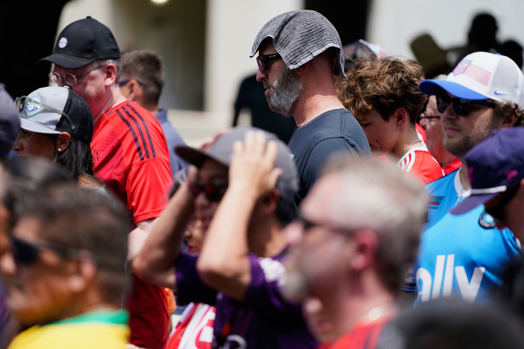 FILE - Soccer fans wait in line to enter Bank of America Stadium for a Club World Cup game, June 24, 2025, in Charlotte, N.C. (AP Photo/Erik Verduzco, File)