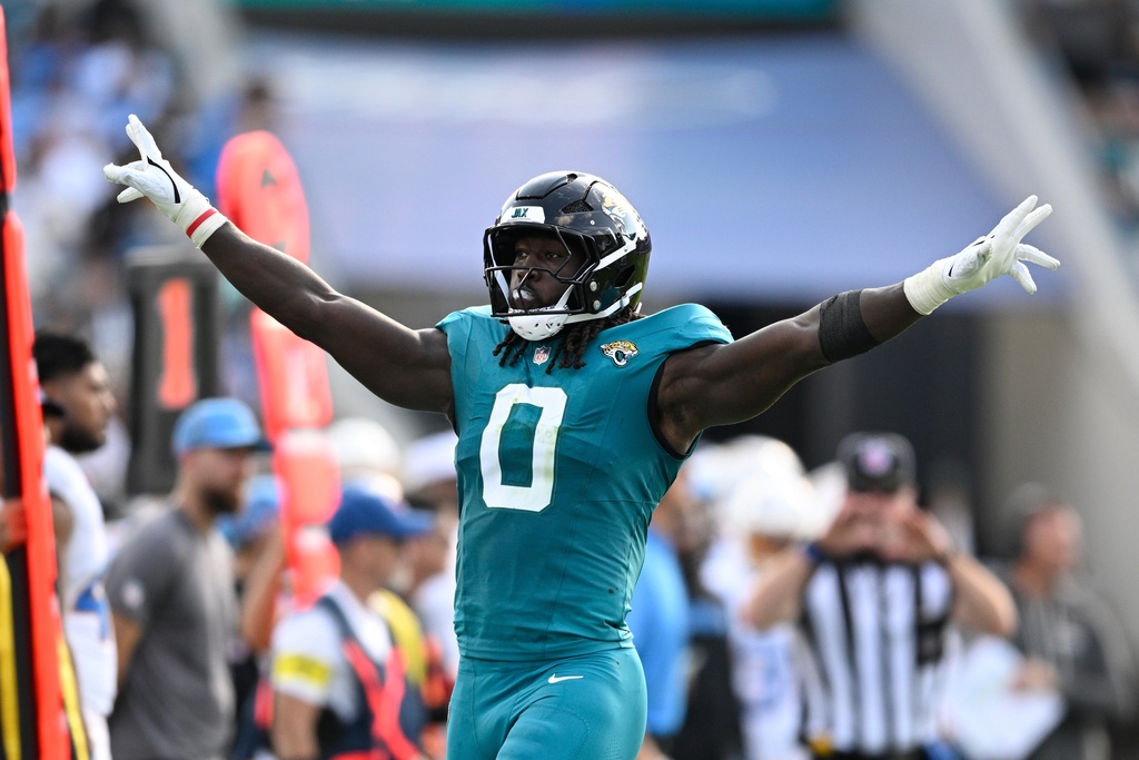 Jacksonville Jaguars' Devin Lloyd reacts during the first half of an NFL football game against the Los Angeles Chargers, Sunday, Nov. 16, 2025, in Jacksonville, Fla. (AP Photo/Phelan M. Ebenhack)