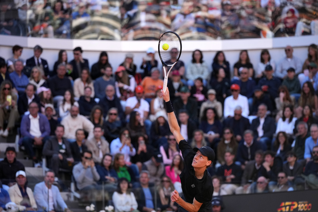 Jannik Sinner, of Italy, returns the ball to Casper Ruud, of Norway, during the final match at the Italian Open tennis tournament, in Rome, Sunday, May 17, 2026. (AP Photo/Andrew Medichini)