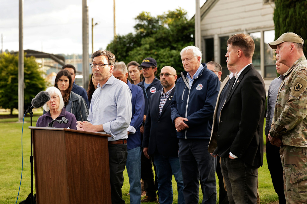Gov. Bob Ferguson speaks during a press conference after a Nippon Dynawave Packaging Co., tank imploded on Tuesday, May 26, 2026, in Longview, Wash. (Karen Ducey/The Seattle Times via AP)