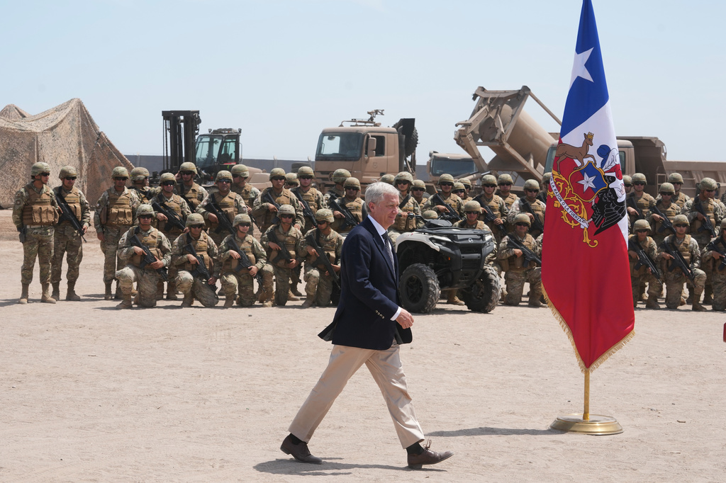 FILE - Chilean President Jose Antonio Kast arrives for a press conference at the military base "Solo de Zaldivar," near the Chacalluta border crossing, in Arica, Chile, March 16, 2026, after signing a decree to deter irregular migration along the northern border with Peru and Bolivia. (AP Photo/Esteban Felix, File)