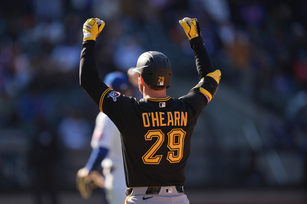 Pittsburgh Pirates' Ryan O'Hearn (29) reacts after hitting an RBI single during the 10th inning of a baseball game against the New York Mets, Sunday, March 29, 2026, in New York. (AP Photo/Seth Wenig)