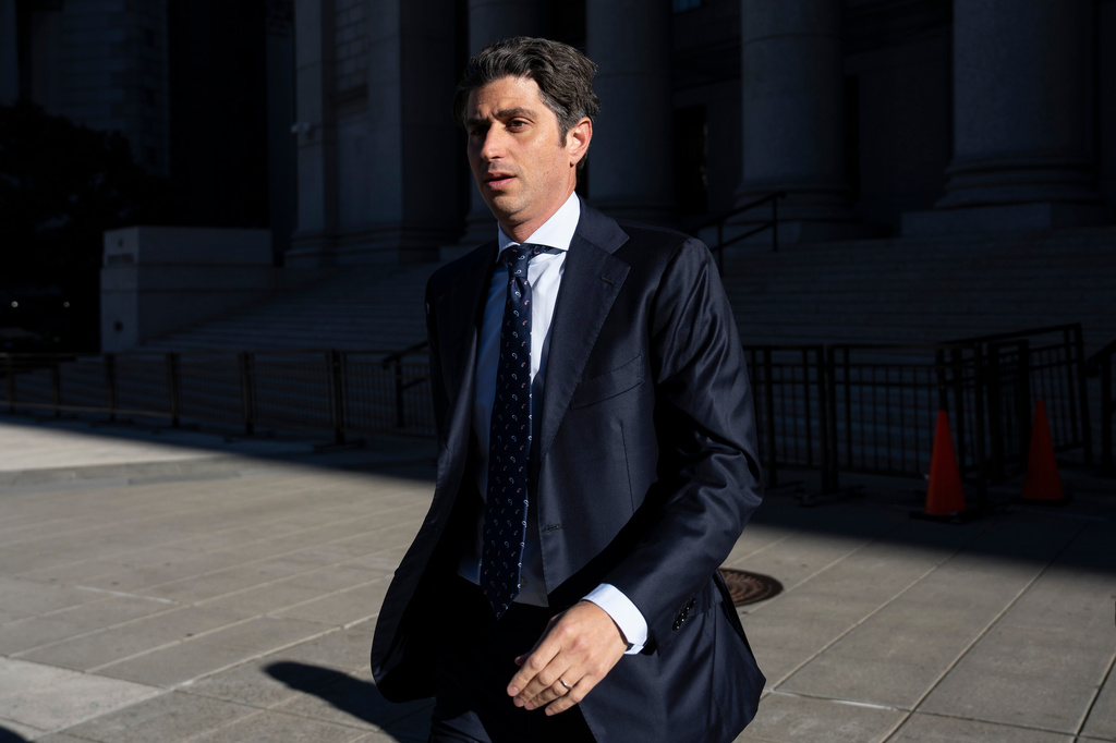 Josh Wander, co-founder of 777 Partners, leaves federal court, Thursday, Oct. 15, 2026, in New York. (AP Photo/Yuki Iwamura)