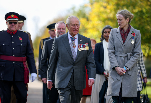 Britain's King Charles, centre, arrives to attend the LGBT+ Armed Forces Dedication Ceremony at the National Memorial Arboretum in Alrewas, England, Monday Oct. 27, 2025. (Phil Noble/Pool via AP) Britain's King Charles, centre, arrives to attend the LGBT+ Armed Forces Dedication Ceremony at the National Memorial Arboretum in Alrewas, England, Monday Oct. 27, 2025. (Phil Noble/Pool via AP)