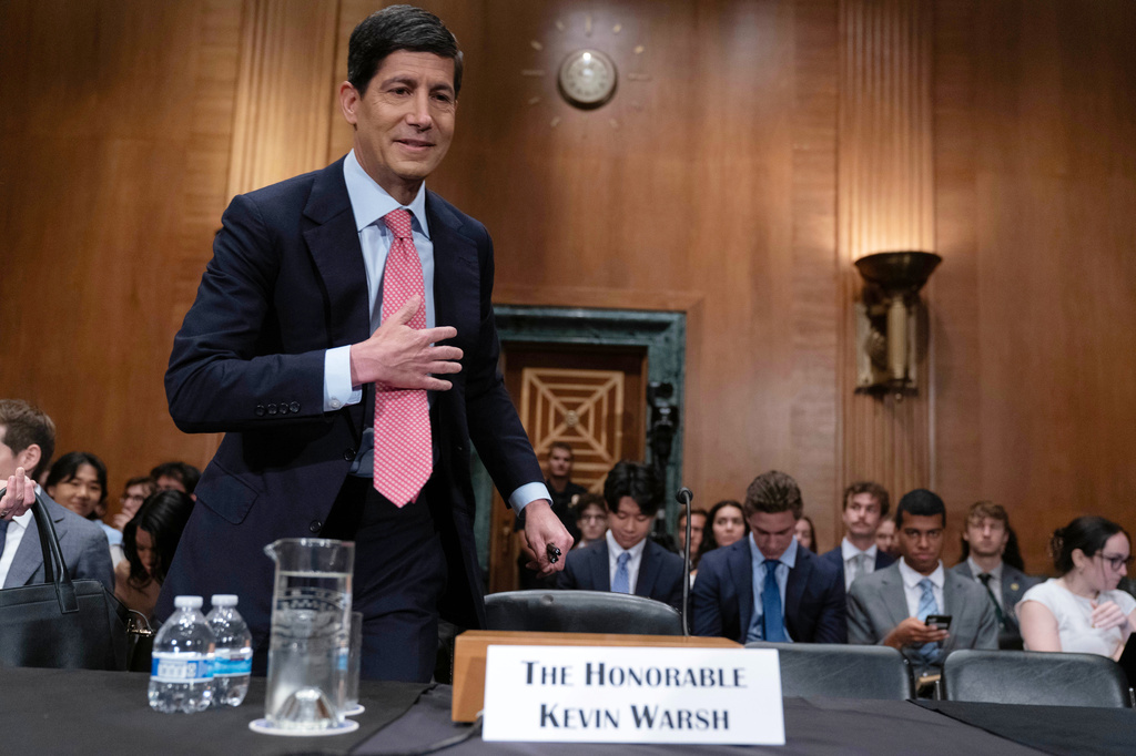 Federal Reserve Chairman Kevin Warsh arrives to testiy before the Senate Banking, Housing and Urban Affairs Committee to deliver the semiannual monetary policy report to Congress, on Capitol Hill, Wednesday, July 15, 2026, in Washington. (AP Photo/Jose Luis Magana)