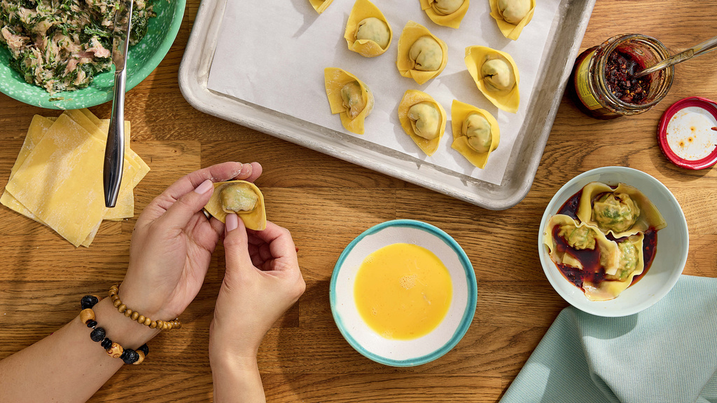 This image released by S&S/Element shows a recipe for Popo's wontons from the cookbook, &ldquo;Have You Eaten Yet?,&rdquo; by Ming-Na Wen. (Jennifer Chong/S&S/Element via AP)