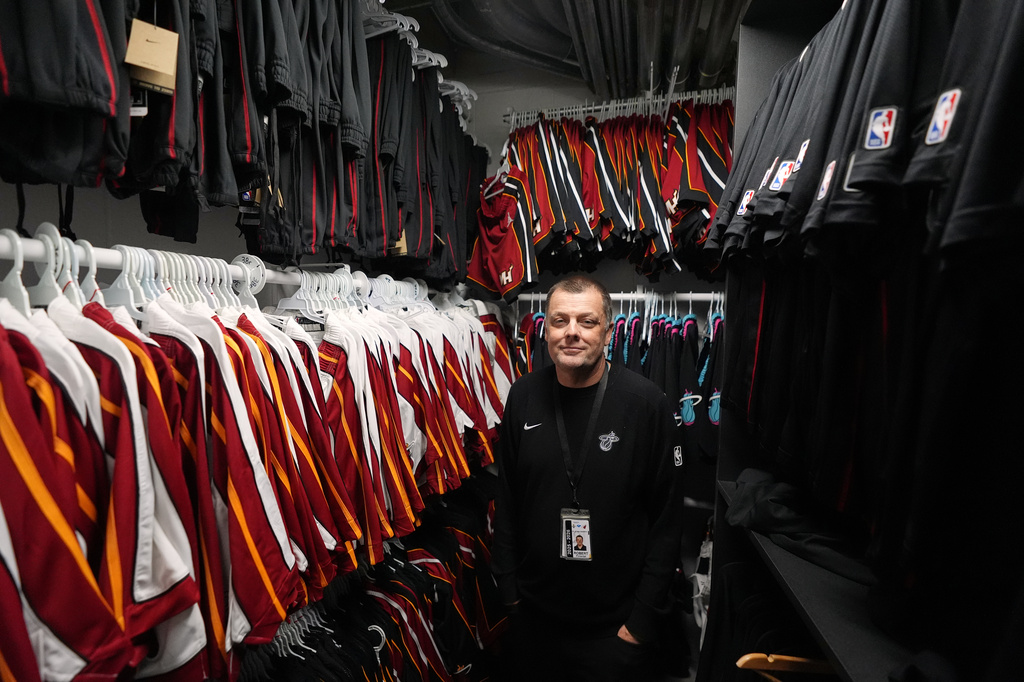 Rob Pimental, Miami Heat's director of team operations, poses for a picture in the team's equipment room following an NBA basketball game between the Miami Heat and the Atlanta Hawks, Sunday, April 12, 2026, in Miami. (AP Photo/Rebecca Blackwell)