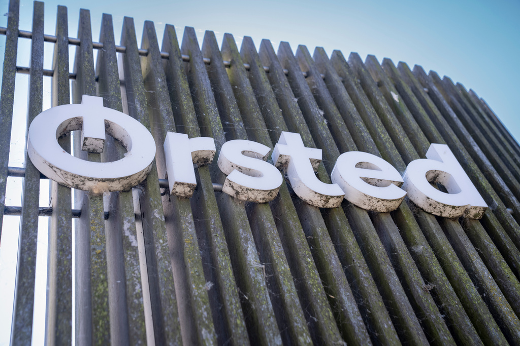 FILE - The logo for the Danish company Orsted is displayed on the exterior of the Avedore Power Station in Hvidovre, Copenhagen, Aug. 19, 2025. (Sebastian Elias Uth/Ritzau Scanpix via AP)