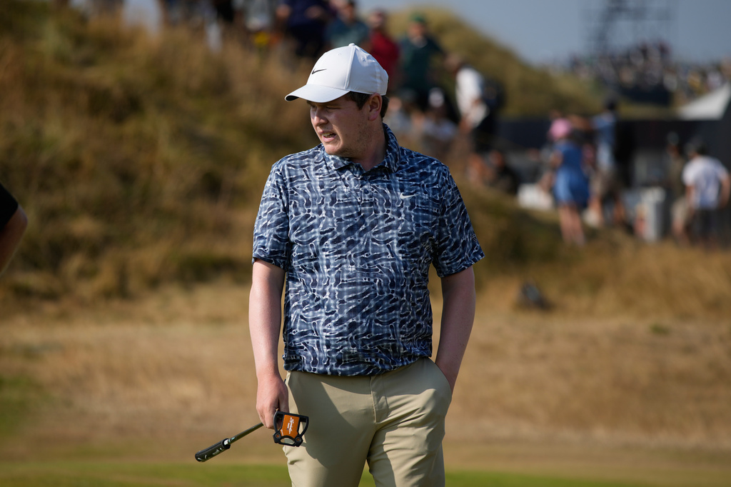 Robert MacIntyre of Scotland looks at his putt on the 11th green during the third day of the British Open Golf championships at Royal Birkdale golf club, in Southport, England, Saturday, July 18, 2026. (AP Photo/David Goldman)
