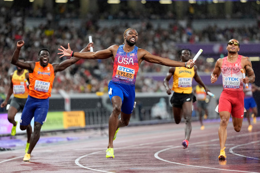 FILE - United States' Noah Lyles anchors the team to gold ahead of Canada's Andre De Grasse and Netherlands' Elvis Afrifa in the men's 4 X 100 meters relay final at the World Athletics Championships in Tokyo, Sept. 21, 2025. (AP Photo/Petr David Josek, File) FILE - United States' Noah Lyles anchors the team to gold ahead of Canada's Andre De Grasse and Netherlands' Elvis Afrifa in the men's 4 X 100 meters relay final at the World Athletics Championships in Tokyo, Sept. 21, 2025. (AP Photo/Petr David Josek, File)