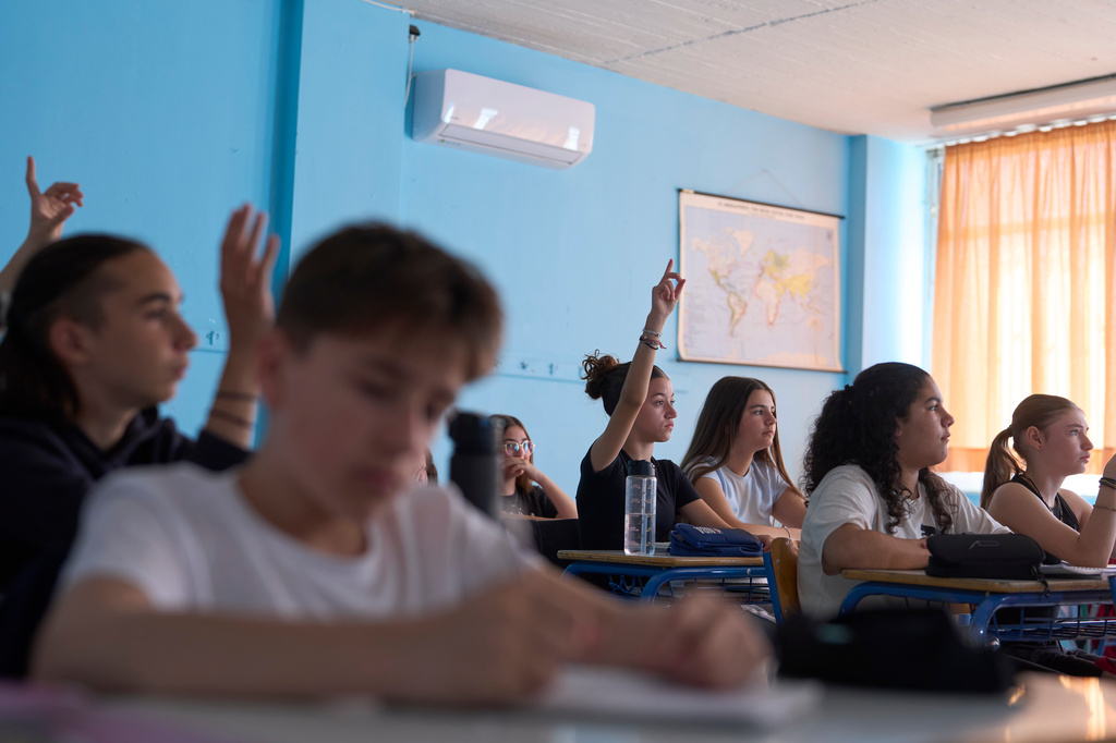 Seventh-grade students participate in a lesson on Homer's Odyssey at a Gymnasio (middle school) in the Athens suburb of Tavros, Wednesday, May 27, 2026. (AP Photo/Petros Giannakouris)