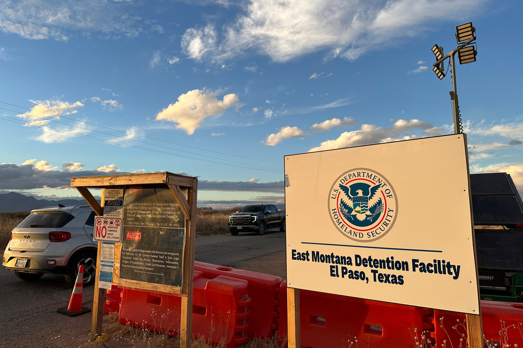 A sign marks the entrance to a series of hardened tents at the Camp East Montana immigrant detention center in the desert at a U.S. Army base on the outskirts of El Paso, Texas, Friday, Feb. 13, 2026. (AP Photo/Morgan Lee)