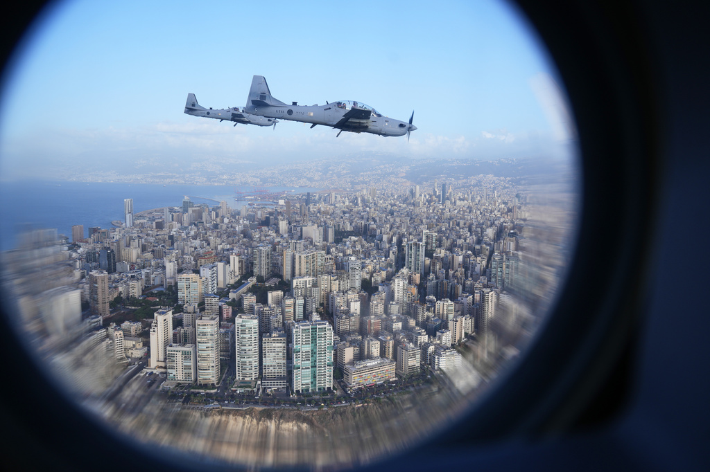 FILE - Lebanese air force fighters escort Pope Leo XIV's plane as it flies over Beirut, Lebanon, on its way to the international airport, Nov. 30, 2025. (AP Photo/Domenico Stinellis, File)