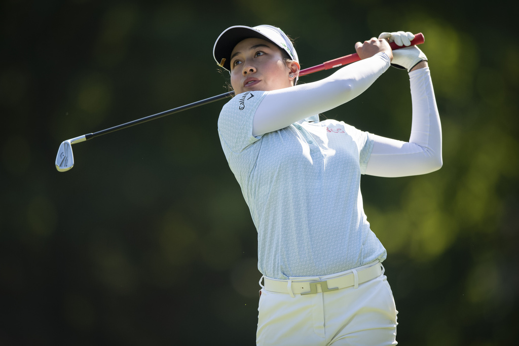 Jeeno Thitikul, of Thailand, tees off on the 16th hole during the fourth round of the Kroger Queen City Championship golf tournament, Sunday, Sept. 14, 2025, at TPC River's Bend in Cincinnati. (AP Photo/Tanner Pearson)